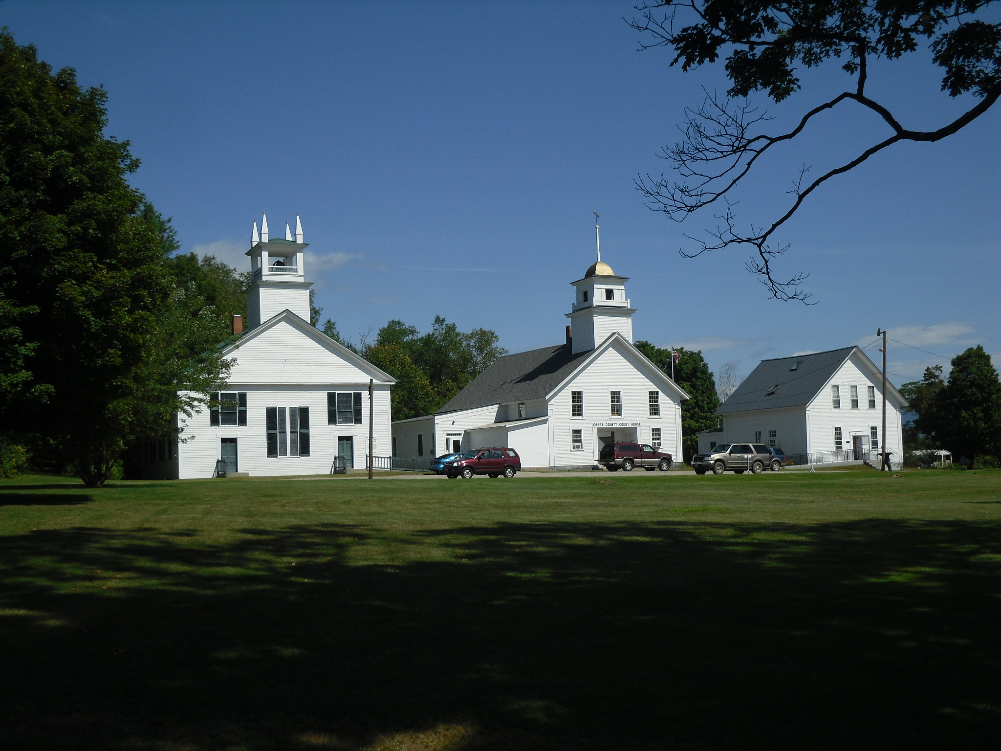 White historic civic buildings around the Guildhall town green