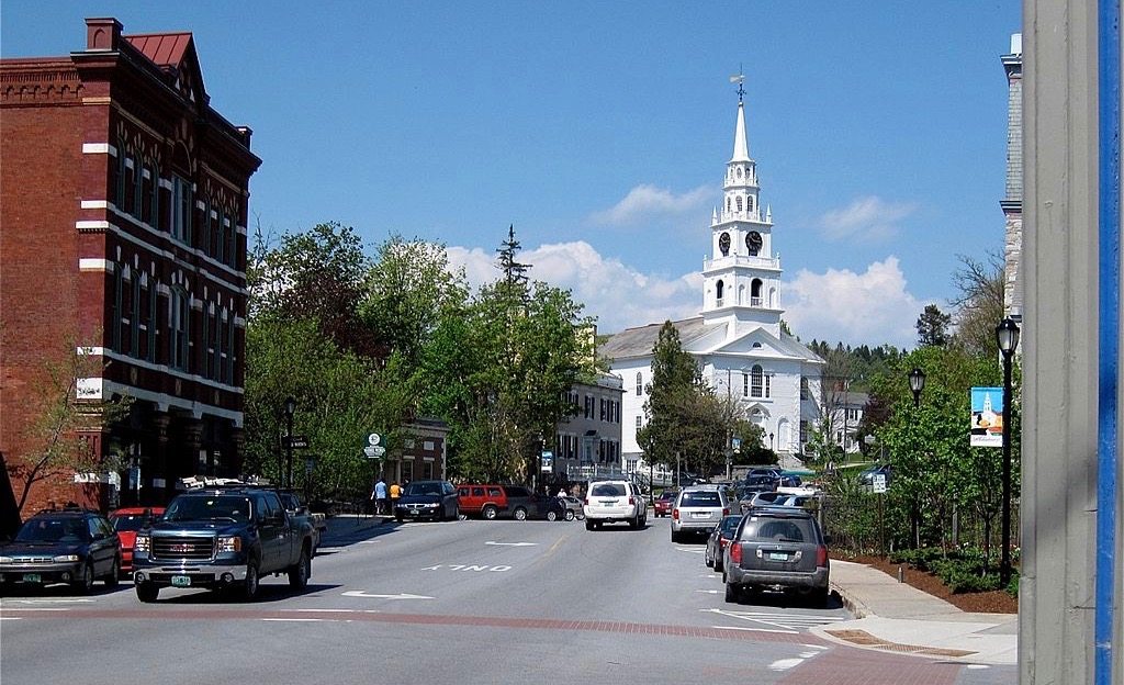 Downtown Middlebury street with a church steeple in the background