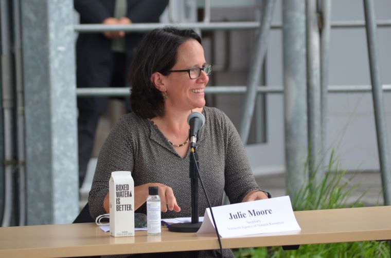 Vermont ANR Secretary Julie Moore speaking into a microphone