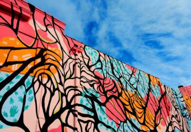 A colorful mural on a downtown wall