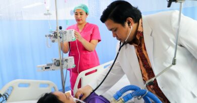 Healthcare worker examining a patient in a hospital