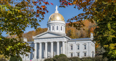 Vermont State House in Montpelier surrounded by fall foliage