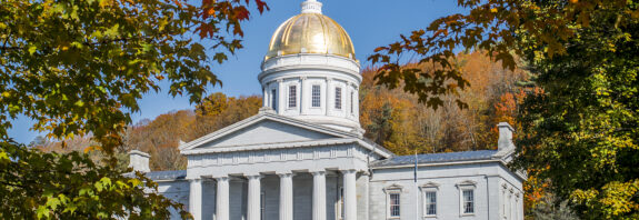 Vermont State House in Montpelier surrounded by fall foliage