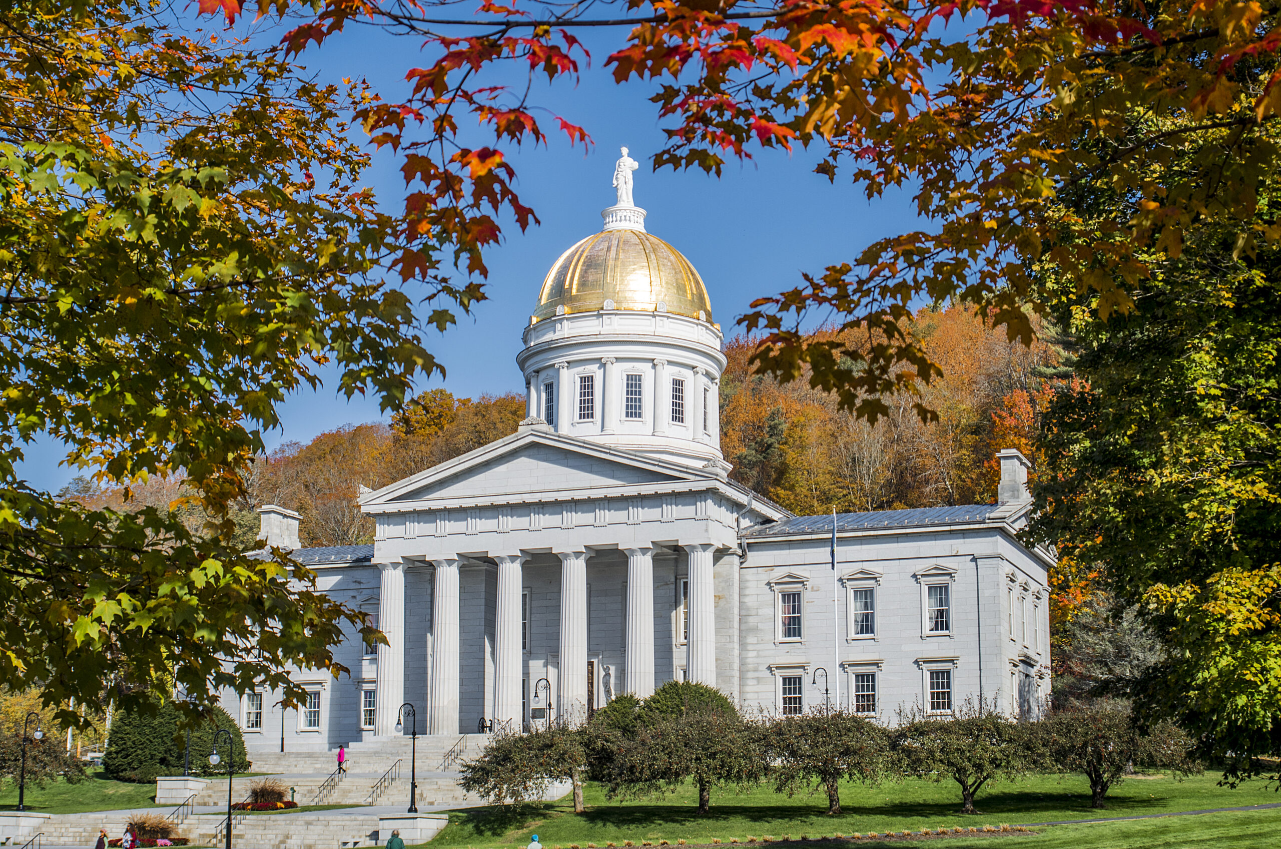 Vermont State House in Montpelier surrounded by fall foliage